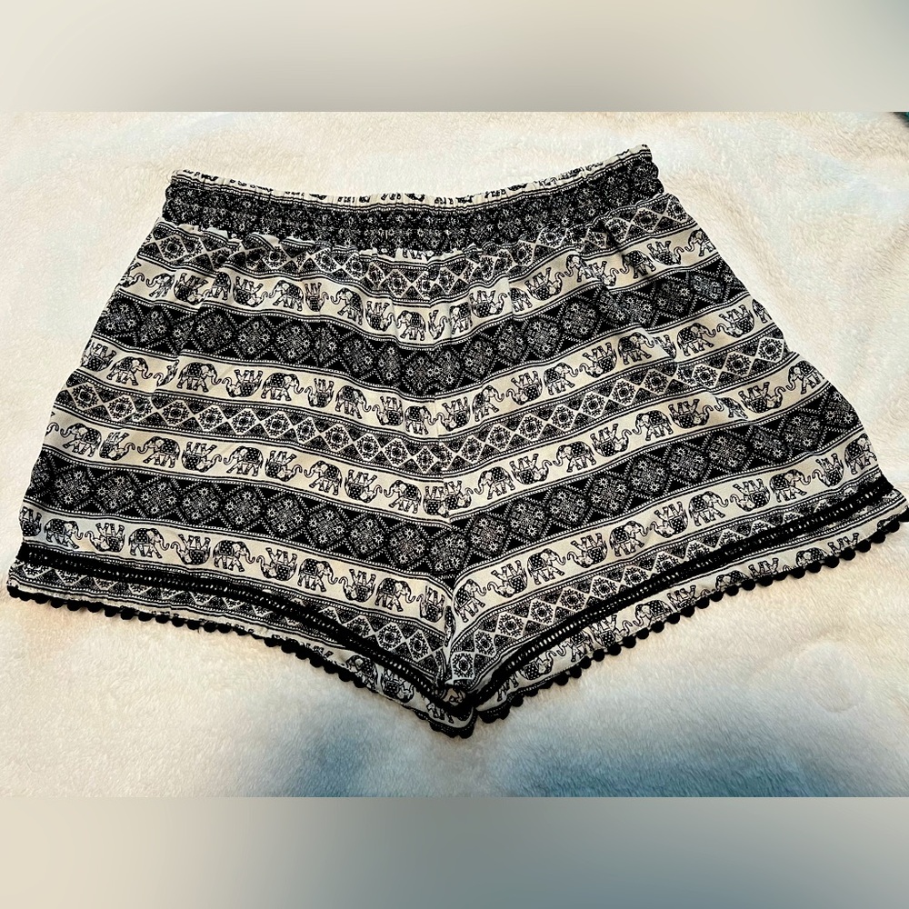 Black and white with elephant print dress shorts.